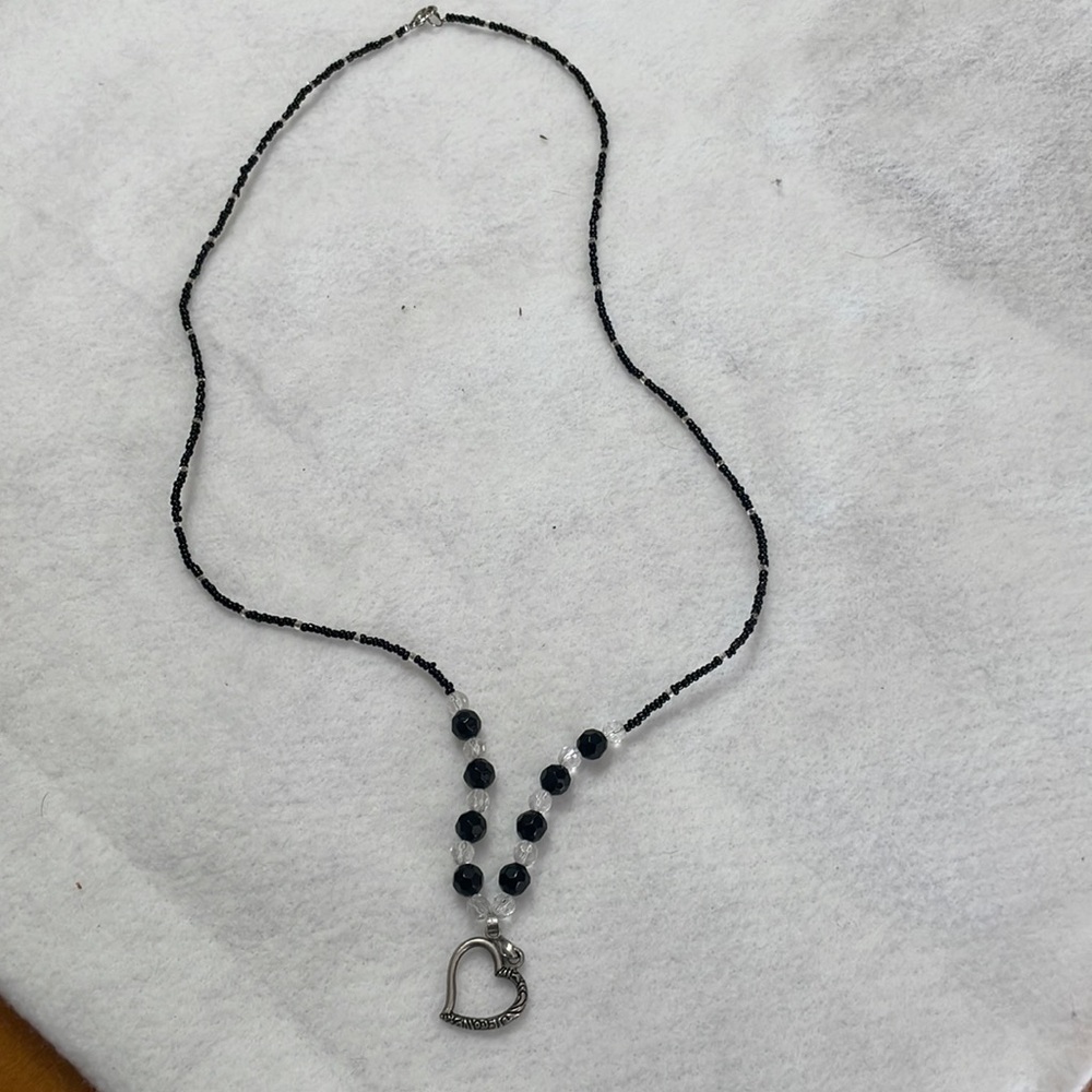 Necklace Badge or glasses holder. Black and clear beads, silver clasp and heart